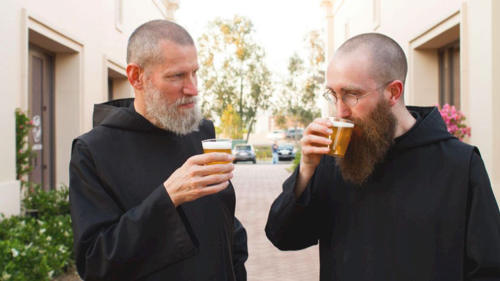 Benedictine monks taste their beer
